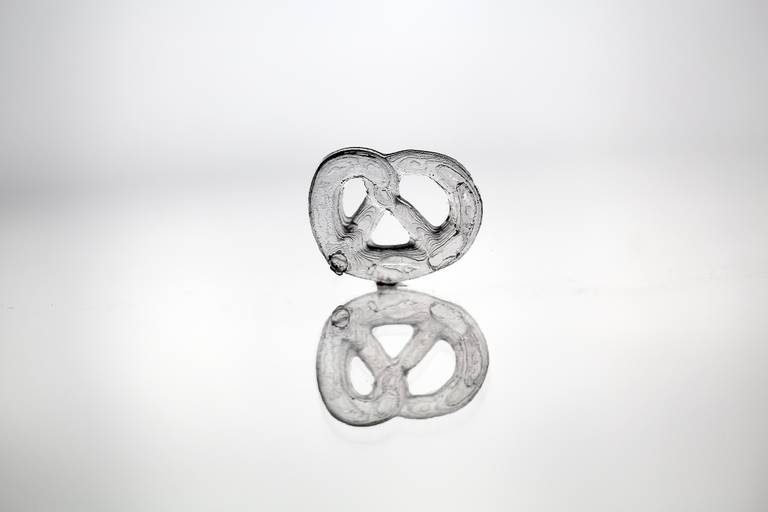 Make a pretzel out of glass? Seriously, this is a demonstration of new technology.